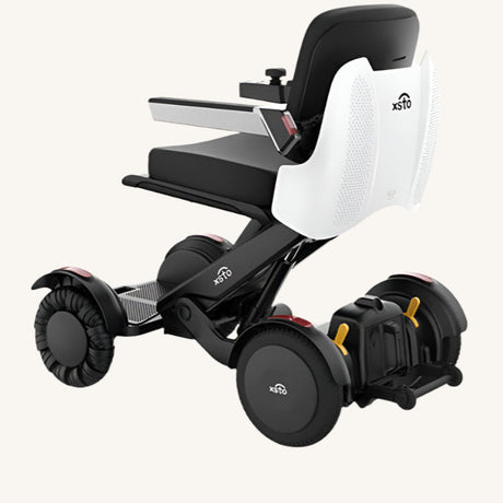 https://cdn.shopify.com/s/files/1/0904/4541/4778/files/m4-electric-wheelchair-_pearl_white.jpg?v=1747995302